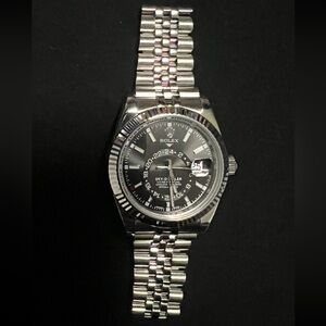 Silver Timepiece with Black Dial